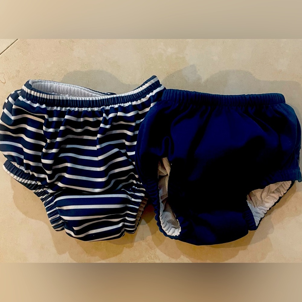 Two swim diapers, 6 months, great condition.